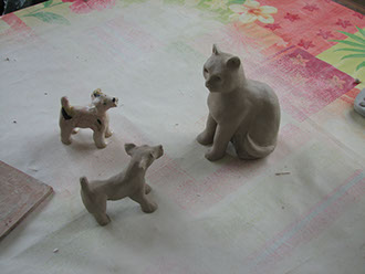 Au grès des saisons chat chien créations sculptures